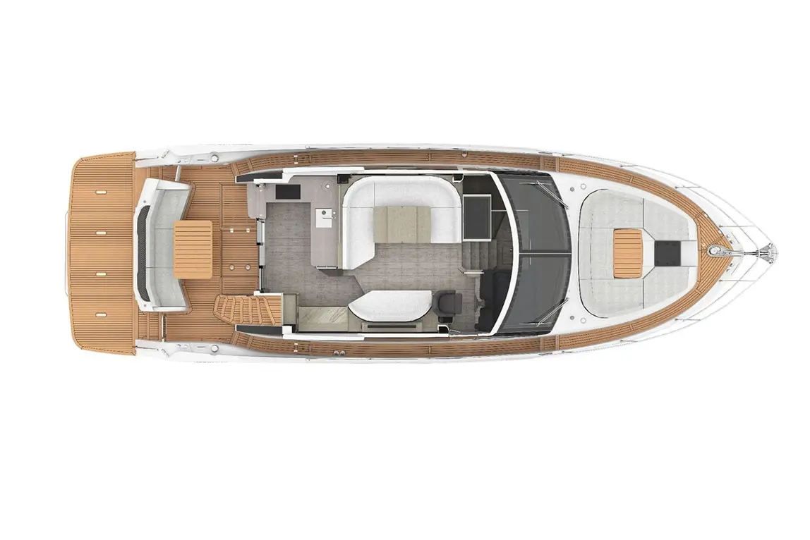Top-down view of a modern yacht interior featuring a lounge area, kitchenette, and outdoor seating on a wooden deck.